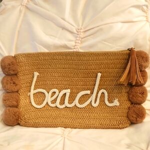Tan Beach Clutch with Pom Poms